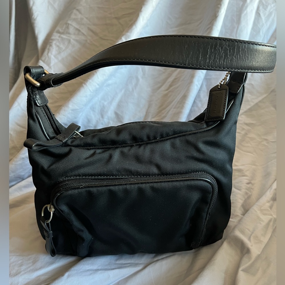 Small black coach purse.   Gently worn.